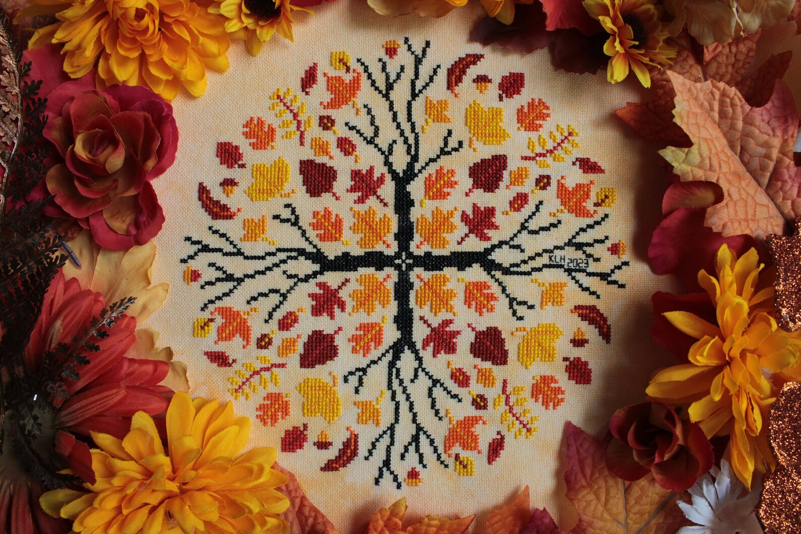 Leaf Pile - Sprouting Lupine - Cross Stitch Pattern