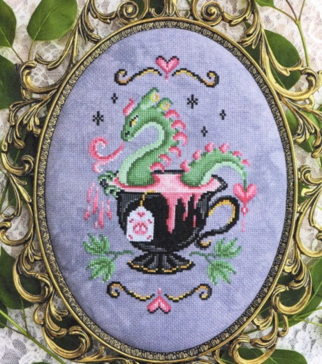 Bleeding Hearts Brew Tea Dragon - Haunted Frames - Cross Stitch Pattern